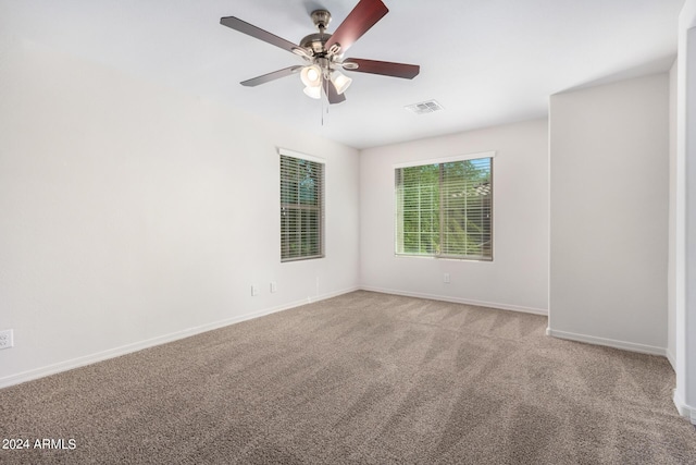 935 E Agua Fria Ln, Avondale, AZ 85323 - unfurnished room with ceiling fan, carpet floors, and baseboards