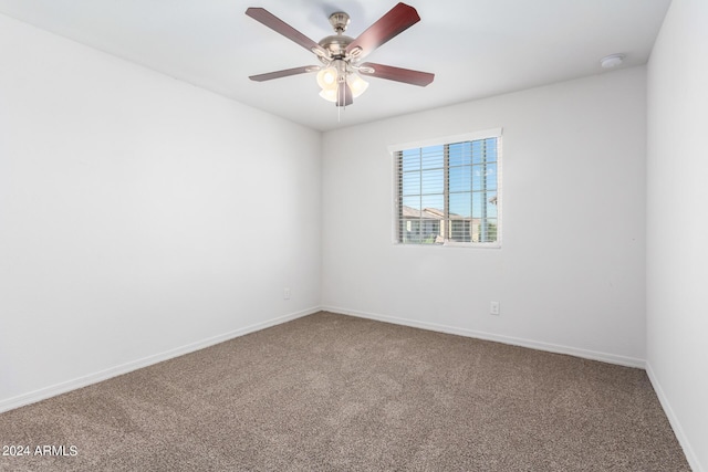 935 E Agua Fria Ln, Avondale, AZ 85323 - spare room featuring carpet flooring, baseboards, and ceiling fan