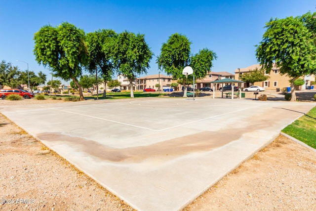 935 E Agua Fria Ln, Avondale, AZ 85323 - view of property's community featuring community basketball court, uncovered parking, and a residential view