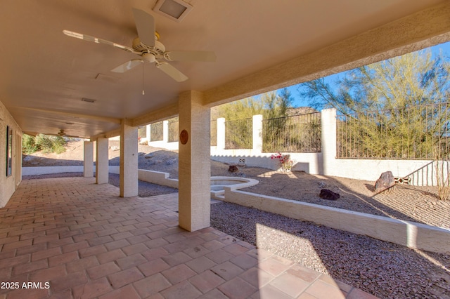 view of patio / terrace featuring ceiling fan