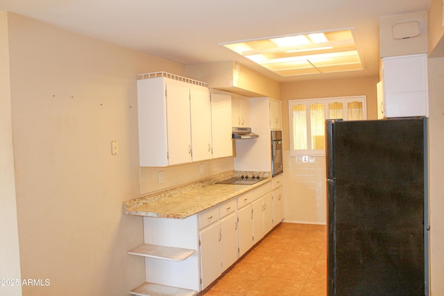 kitchen with white cabinets, open shelves, light countertops, under cabinet range hood, and black appliances