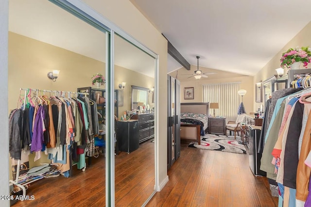 3121 W Greenway Rd, Phoenix, AZ 85053 - spacious closet with ceiling fan, hardwood / wood-style floors, and lofted ceiling with beams