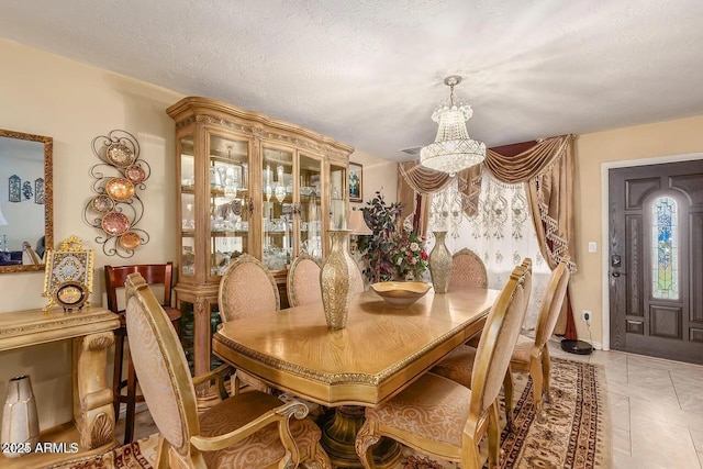 3121 W Greenway Rd, Phoenix, AZ 85053 - dining area with a notable chandelier