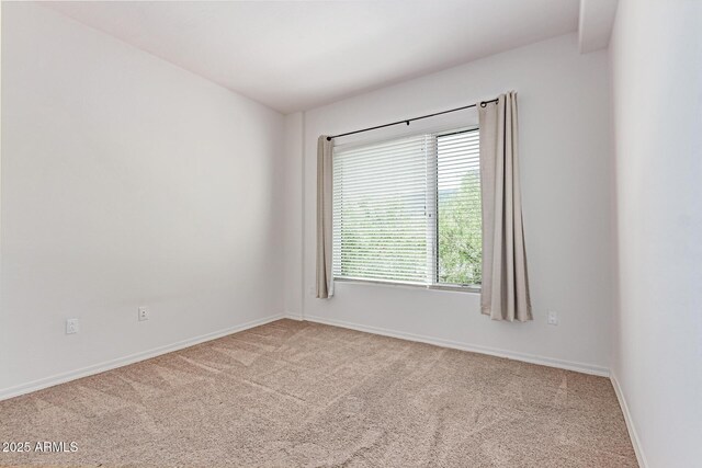 16 W Encanto Blvd Unit 26, Phoenix, AZ 85003 - carpeted empty room featuring baseboards