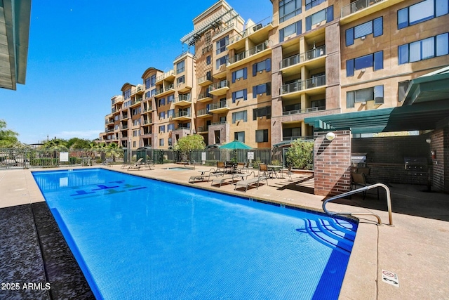 16 W Encanto Blvd Unit 26, Phoenix, AZ 85003 - community pool featuring a patio