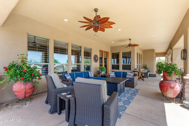 view of patio with ceiling fan and an outdoor hangout area