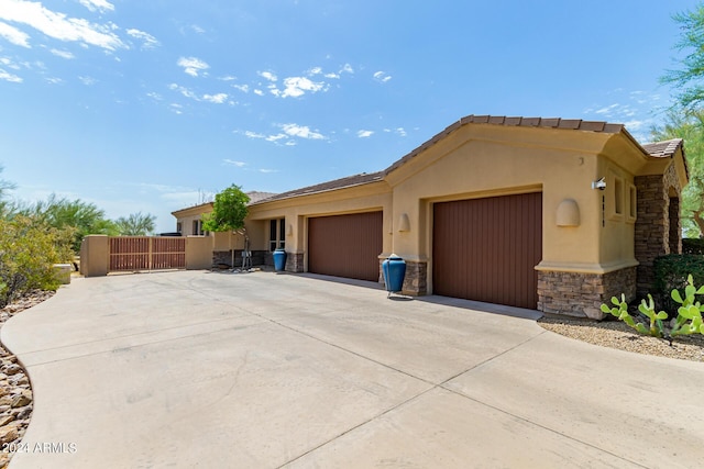 view of front of home with a garage