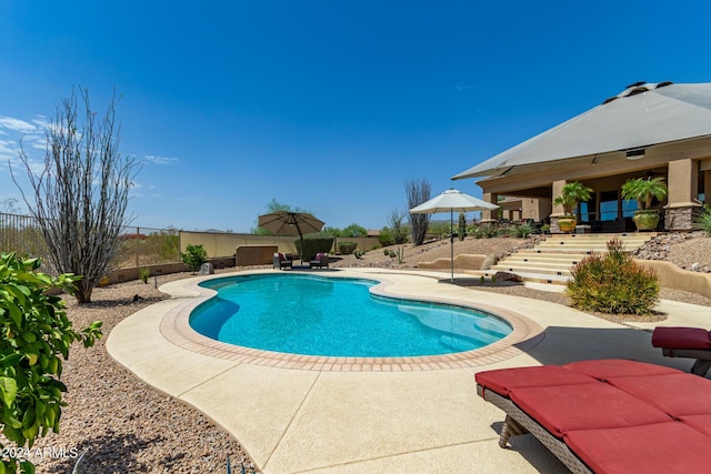 view of pool featuring a gazebo and a patio area