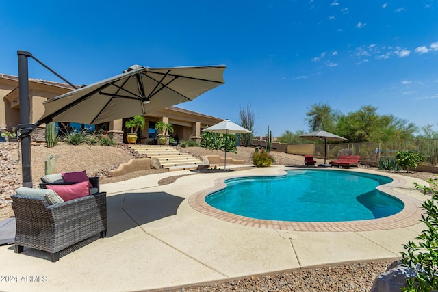 view of pool with a patio area