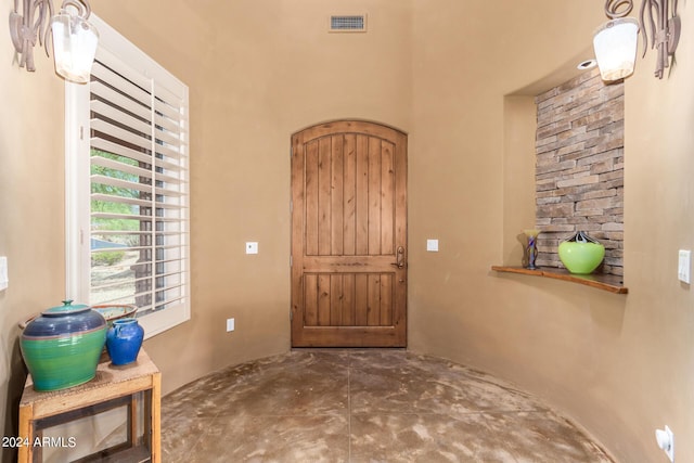 foyer featuring concrete flooring