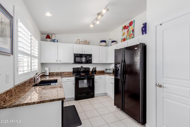 1341 E Bellerive Dr, Chandler, AZ 85249 - kitchen with black appliances, white cabinetry, light tile patterned flooring, and dark stone countertops