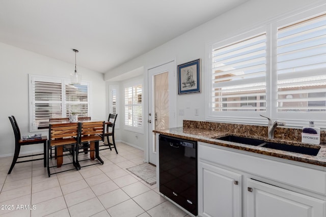 1341 E Bellerive Dr, Chandler, AZ 85249 - kitchen with black dishwasher, vaulted ceiling, white cabinets, dark stone countertops, and hanging light fixtures