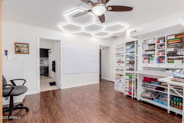 1341 E Bellerive Dr, Chandler, AZ 85249 - office area with a ceiling fan and wood finished floors