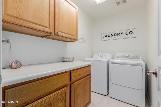 1341 E Bellerive Dr, Chandler, AZ 85249 - laundry area with cabinet space, washer and dryer, and light tile patterned floors