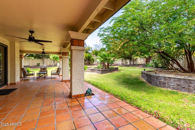 view of patio with ceiling fan