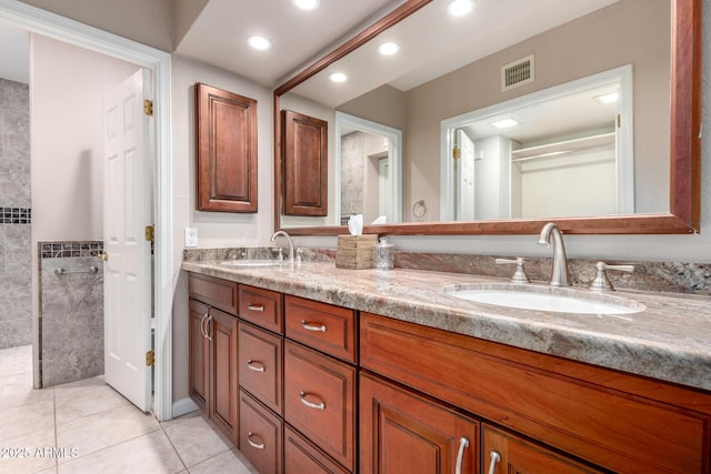 full bathroom with a walk in shower, tile patterned floors, double vanity, and recessed lighting