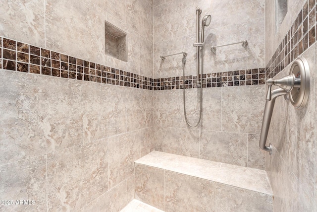 bathroom view of tiled shower