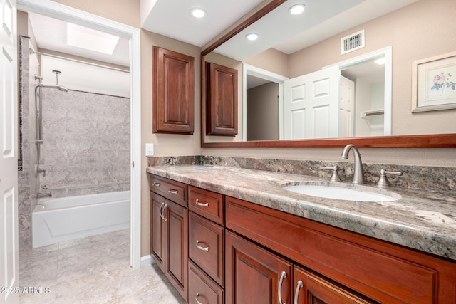 full bath with double vanity, recessed lighting, tub / shower combination, and tile patterned flooring