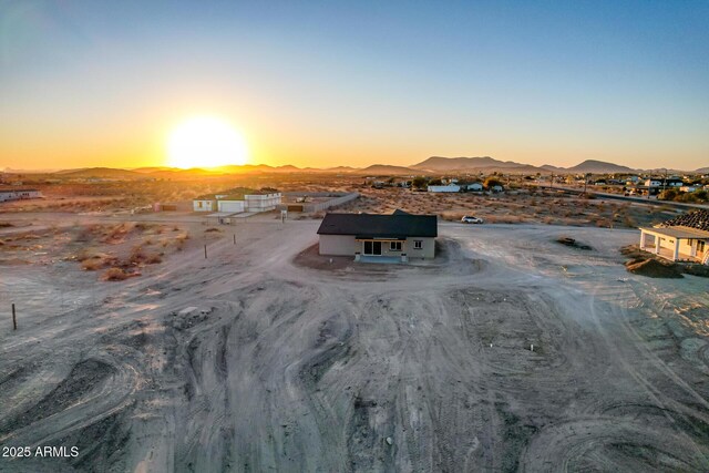 aerial view at dusk with a mountain view