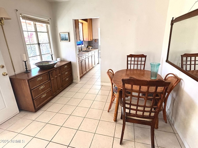 dining room with light tile patterned flooring