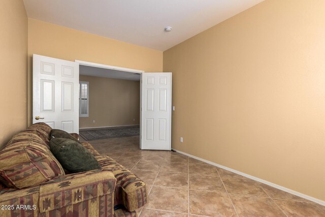2526 W Florentine Rd, Phoenix, AZ 85086 - living area with tile patterned flooring and baseboards
