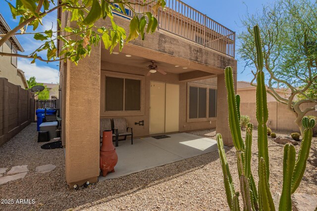 2526 W Florentine Rd, Phoenix, AZ 85086 - rear view of house featuring a ceiling fan, a fenced backyard, stucco siding, and a patio area