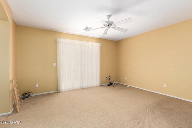2526 W Florentine Rd, Phoenix, AZ 85086 - empty room with carpet floors, a ceiling fan, and baseboards
