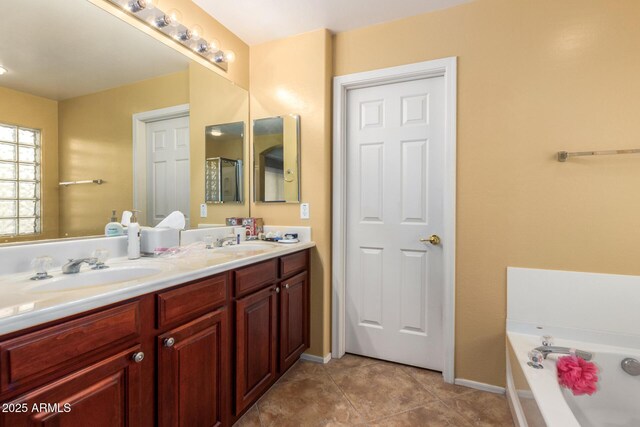 2526 W Florentine Rd, Phoenix, AZ 85086 - full bathroom with double vanity, a bath, tile patterned flooring, and baseboards