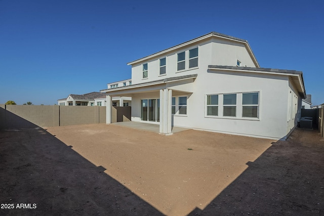 rear view of house featuring a patio