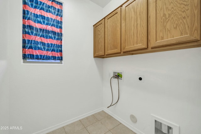 laundry room with cabinets, washer hookup, hookup for a gas dryer, and hookup for an electric dryer