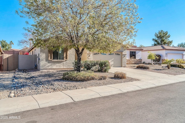 obstructed view of property with a garage