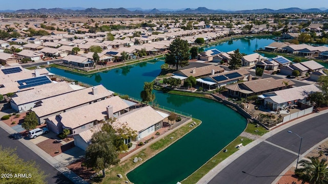 aerial view with a water and mountain view