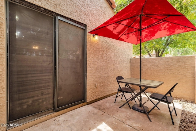 3491 N Arizona Ave Unit 118, Chandler, AZ 85225 - view of patio featuring outdoor dining space