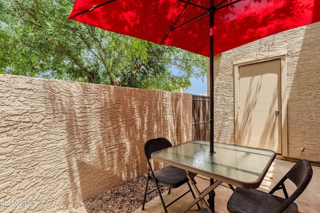 3491 N Arizona Ave Unit 118, Chandler, AZ 85225 - view of patio with outdoor dining area