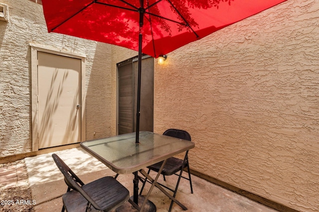 3491 N Arizona Ave Unit 118, Chandler, AZ 85225 - view of patio with outdoor dining space