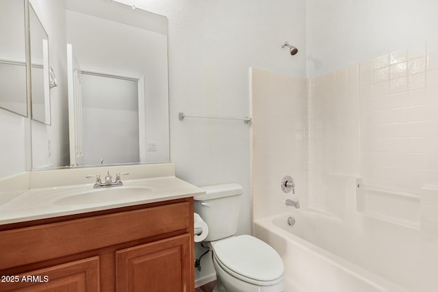 bathroom with  shower combination, vanity, and toilet