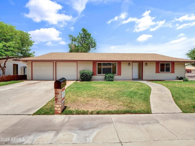 1306 W 12th St, Tempe, AZ 85281 - ranch-style home with an attached garage, concrete driveway, and a front yard
