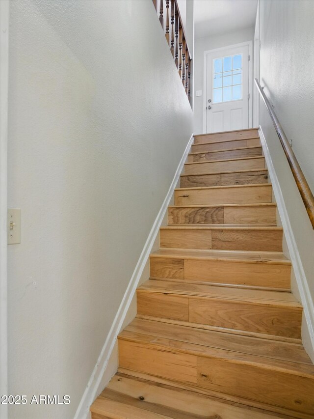 1306 W 12th St, Tempe, AZ 85281 - staircase featuring wood finished floors and baseboards