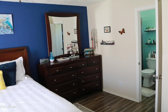 4767 W Wahalla Ln, Glendale, AZ 85308 - bedroom featuring dark wood-style flooring and ensuite bath
