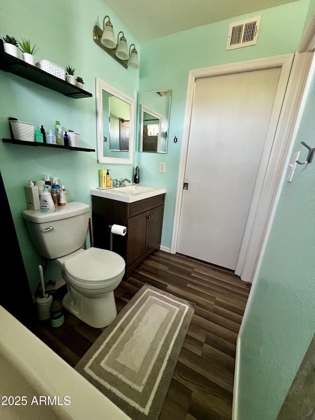 4767 W Wahalla Ln, Glendale, AZ 85308 - bathroom featuring wood finished floors and vanity
