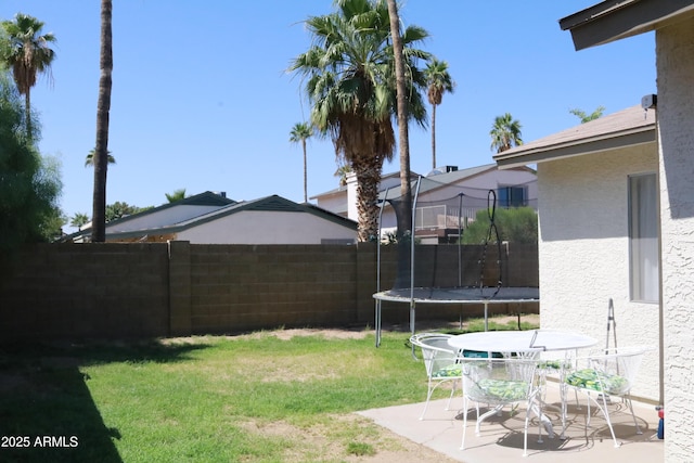 4767 W Wahalla Ln, Glendale, AZ 85308 - view of yard featuring a trampoline and a patio
