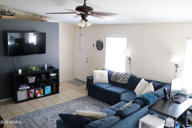 4767 W Wahalla Ln, Glendale, AZ 85308 - living area with a ceiling fan, light tile patterned flooring, and a textured ceiling