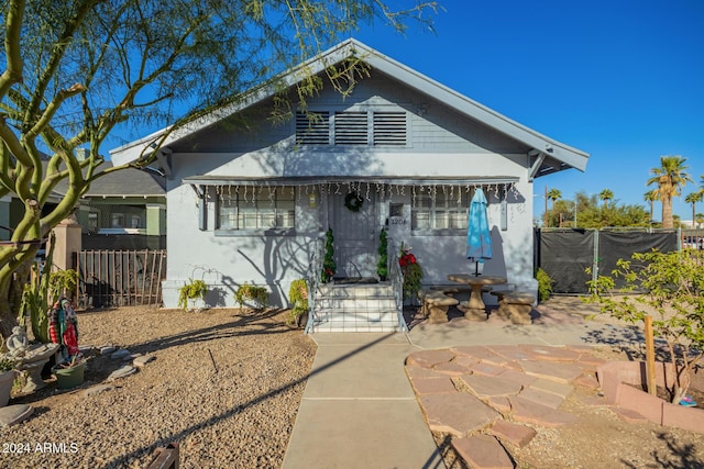 bungalow with a patio