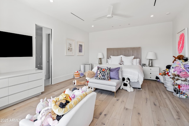 bedroom with ceiling fan and light wood-type flooring