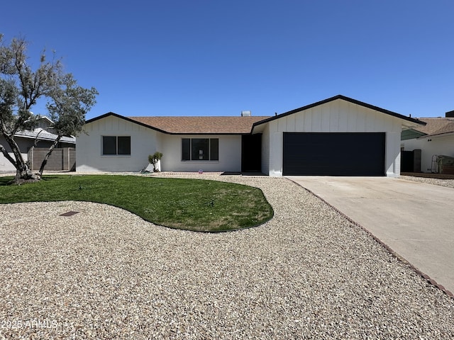 14803 N 55th Ave, Glendale, AZ 85306 - ranch-style house featuring concrete driveway, a front lawn, and an attached garage