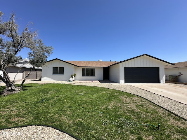 14803 N 55th Ave, Glendale, AZ 85306 - ranch-style house with a front yard, driveway, and a garage