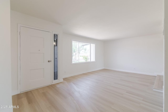 14803 N 55th Ave, Glendale, AZ 85306 - spare room with light wood-style flooring and baseboards