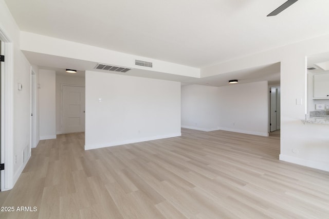 14803 N 55th Ave, Glendale, AZ 85306 - empty room featuring light wood-style flooring, ceiling fan, baseboards, and visible vents