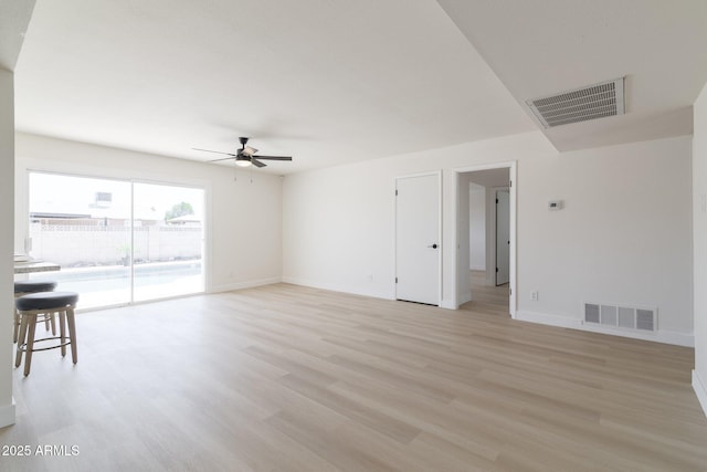 14803 N 55th Ave, Glendale, AZ 85306 - unfurnished room featuring visible vents, ceiling fan, light wood finished floors, and baseboards