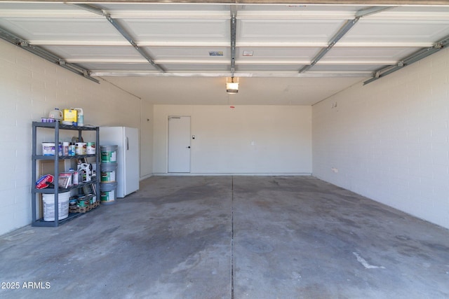 14803 N 55th Ave, Glendale, AZ 85306 - garage with a garage door opener and fridge